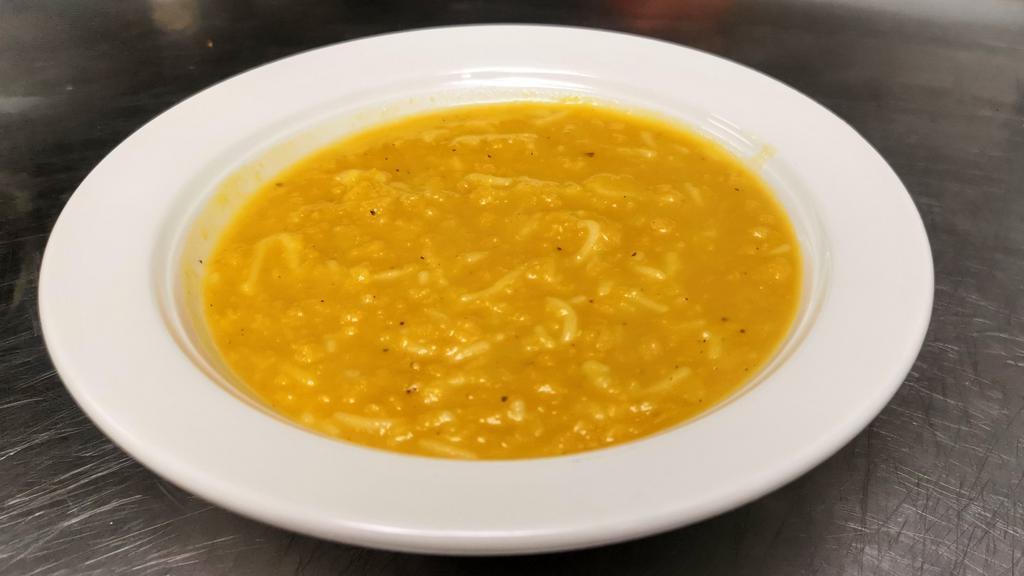 Lentil Soup · Vegan. Boiled red lentils, cooked with fresh onions, seasonings, and extra virgin olive oil.