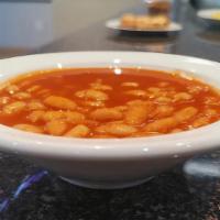 White Bean Soup · Vegan. Fresh white beans, cooked with tomato paste, Arabic seasonings, and garlic.