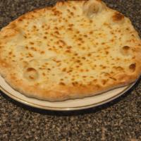 Cheese Manakeesh · flat bread topped with  special cheese  .  served fresh from the oven