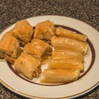 Baklava Large Container  · 8 pieces of Baklava. Layered pastry dessert made of phyllo pastry, filled with chopped walnu...