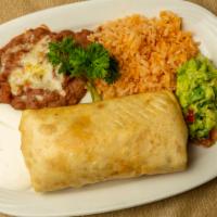 Chimichanga Primavera · Big crispy fried flour tortilla stuffed with vegetables served with rice, refried beans, gua...
