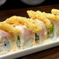 Maki Carretillero Fusion  · shrimp tempura avocado,top white fish  acevichado sauce , little fried calamar