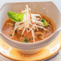 Asam Laksa · Spicy and sour rice noodles served in chef's special lemon grass broth with fish flakes. Hot...