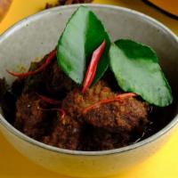 Beef Rendang · Beef cooked in a thick spicy curry sauce with coconut milk and lime leaf. Hot and spicy.
