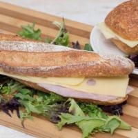 Jambon And Emmentel Sandwich · Fresh Baguette with Butter, Ham and Swiss Cheese

** For optimal freshness please do not hav...