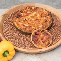 Quiche With Yellow And Red Peppers Individual With Side Salad · Made with fresh, seasonal vegetables, local when possible.<br />Whole quiche for up to 4 peo...