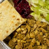 Chicken Platter · Served over rice with lettuce, purple salad and pita.