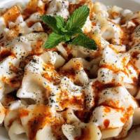 Manti (Turkish Beef Dumplings) · Traditional Turkish beef dumplings. Seasoned ground beef wrapped in egg pasta. Topped with g...