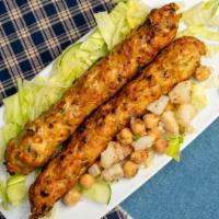 Chicken Kabab · One piece. Minced chicken marinated in yogurt, garlic, ginger and spices.