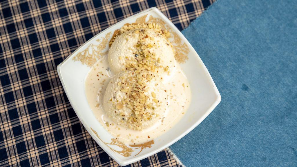 Rasmalai · Two pieces. Fresh homemade cheese in sweetened cream sauce, cashews, pistachios and nuts.