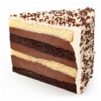 Cake - Black & White · Alternating layers of vanilla and chocolate cake, filled with our homemade chocolate fudge i...
