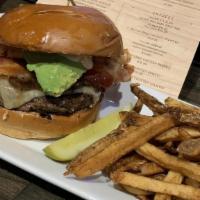 The Jackie B Burger · 8 oz Black Angus Beef Patty topped with applewood smoked bacon, caramelized red onion, avoca...