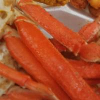 Crab Legs · with corn and butter sauce