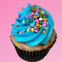 Blue Birthday Cake Cupcake · Rainbow confetti cake with blue vanilla frosting and pastel-colored confetti sprinkles || ve...