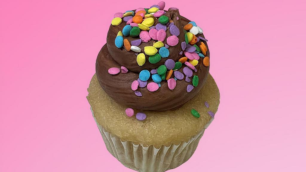 Gluten-Free Vanilla Chocolate Cupcake · vanilla cake with chocolate frosting, topped with pastel-colored confetti sprinkles. || vegan, dairy-free, egg-free, soy-free, gluten-free. made without nuts.