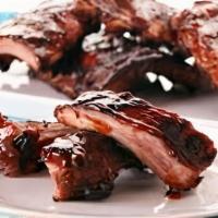 Barbecue Ribs · White rice, beans and green salad or French fries.