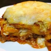 Pastelon · Potato, Beef or Chicken and Cheese.