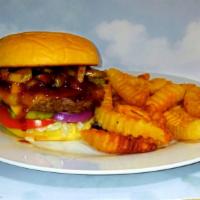 Bourbon Burger. · cheddar cheese, bacon, sautéed mushrooms, bell peppers & onions, bourbon sauce, lettuce, tom...
