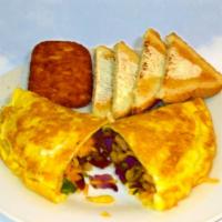 Ultimate Omelette. · Three-egg omelette with sausage, bacon, bell peppers & onions, sautéed mushrooms and cheddar...