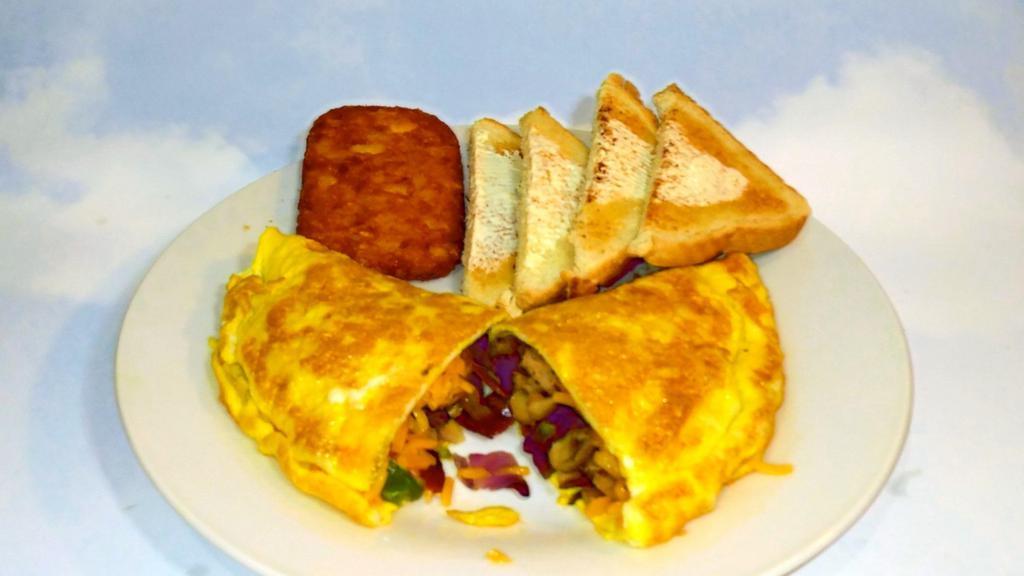 Ultimate Omelette. · Three-egg omelette with sausage, bacon, bell peppers & onions, sautéed mushrooms and cheddar cheese. Served with hash browns, choice of bread and a drink.