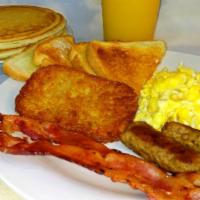 Lumberjack Breakfast. · Buttermilk pancakes, bacon strips, sausage links, eggs,* hash browns and choice of bread. Se...