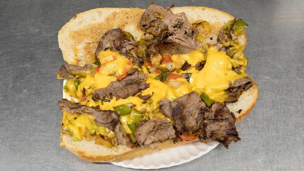 Philly Cheese Steak · Grilled Steak, Sauteed Onions & Melted American Cheese on a Store Made Hero.