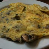 Fresh Mushroom Omelette · Made with three extra large eggs. Served with your choice of toast.