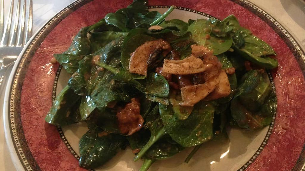 Spinach Salad · Served with warm mushrooms and crispy bacon.