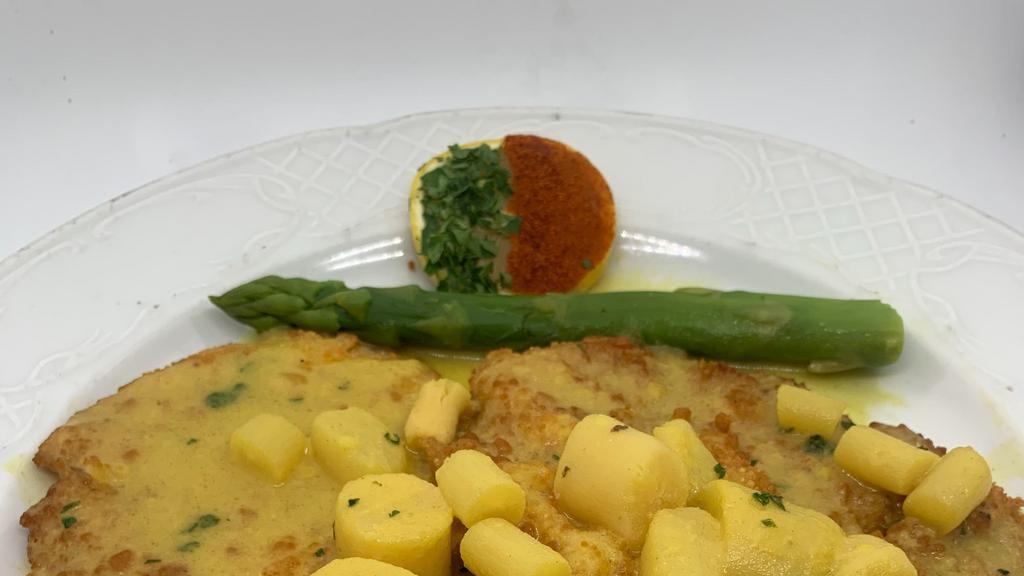 Veal Alla Galleria · Braised with parmesan cheese, sautéed in a white wine sauce and topped with Belgian salsify.