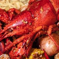 Lobster 1.25Lbs · Flavored perfectly with your choice of sauce with 1 corn and 1 potato