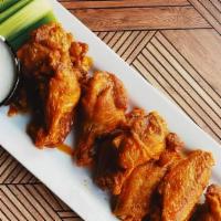 Buffalo Wings (25 Pieces) · Authentic buffalo flavor- fuzed, new york-style chicken wings hand-spun in choice of sauce. ...