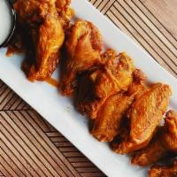 Buffalo Wings (50 Pieces) · Authentic buffalo flavor- fuzed, new york-style chicken wings hand-spun in choice of sauce. ...