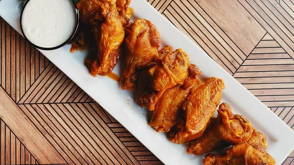 Buffalo Wings (50 Pieces) · Authentic buffalo flavor- fuzed, new york-style chicken wings hand-spun in choice of sauce. Served with blue cheese and celery.