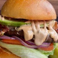 Chipotle Burger · Our chipotle burger is served on a toasty bun and topped with avocado, Monterrey jack cheese...