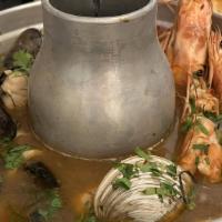 Seafood Hot Pot · Prawn, mussels, clam, squid, and calamari in spicy herb broth