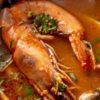 Tom Yum Soup · Spicy soup, lemongrass, lime leaf with choice of shrimp or chicken.
