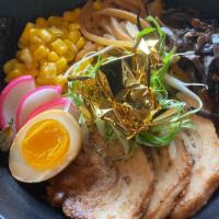 Kinya Ramen · Natural rich and smooth pork broth with black garlic oil flavor, topped with fish cake, chop...