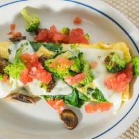 Vegetable Omelette · Fresh spinach, tomatoes, mushrooms, broccoli, mozzarella cheese & avocado.