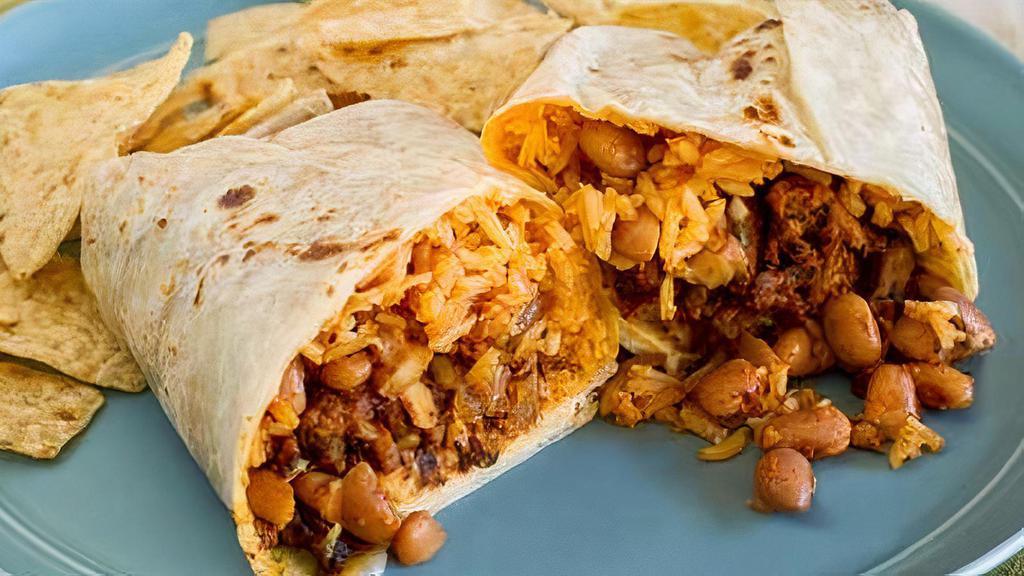 Pastor Burrito Passion · #burrito#mexican#pastor burrito our famous mouthwatering pulled pork burritos. Our tortas are topped with beans, tomatoes, sour cream, lettuce, and cheese. You could also decide to just top it with cilantro and onions.