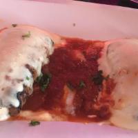 Eggplant Rollatini · Thinly sliced eggplant, dusted with flour then 