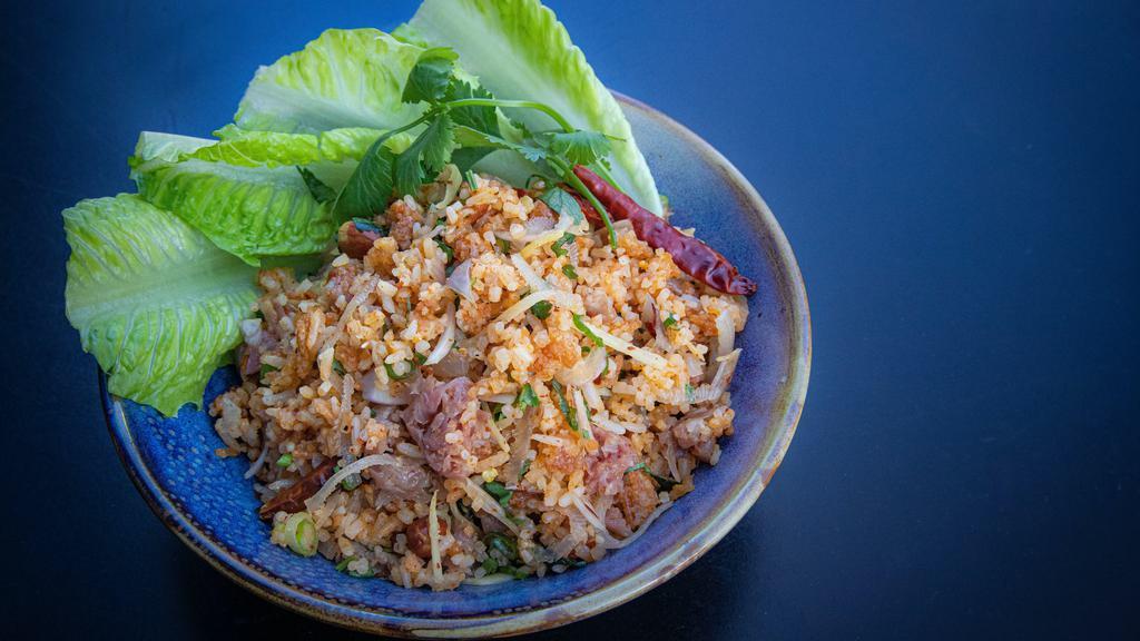 Nam Khluk  · Spicy, gluten free.  laotian crispy rice with fermented pork sausage, chili, roasted peanuts, shallot, scallion, cilantro, and ginger. (Spicy,Gluten free)