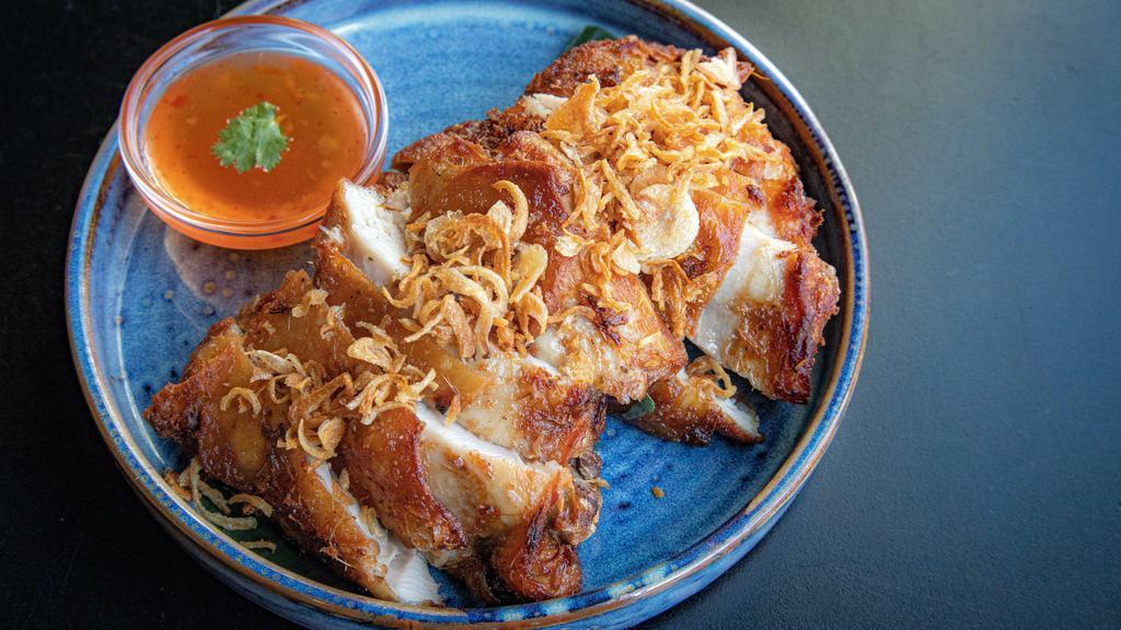Gai Tod Hat Yai · our favorite fried crunchy chicken thigh from hat yai topped with crispy shallot served with sweet chili sauce