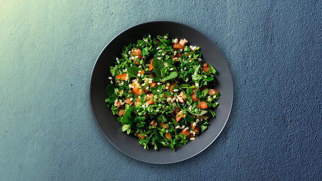 Tempting Tabbouleh · Cracked wheat, lemon juice, and olive oil mixed with chopped fresh parsley, tomato