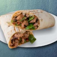 Shredded Beef & Lamb Gyro Wrap · Lamb and beef served with lettuce, veggies, tzatziki, and chutney sauce on pita bread.