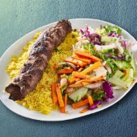 Lamb Kabob Combo Dinner · Lamb kabob combo dinner made of tahini, sauce spicy house sauce, pita bread, and pickles ser...