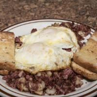 Homemade Corned Beef Hash · Favorite. Topped with two eggs any style, and choice of toast.