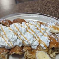 Banana Caramel Pecan Pancakes · Out of this world. Filled with caramel and our homemade cream cheese icing. Add three oz NY ...