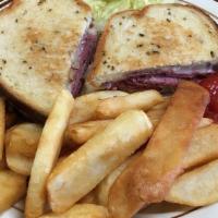 Mr Reuben Sandwich · Our number one seller. A distinguished sandwich for our customers. Corned beef, smothered wi...