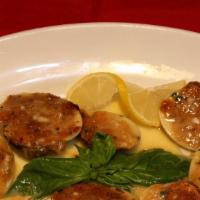 Baked Clams (Gf) · Clams on the half shell with seasoned breadcrumbs and lemon sauce. Gluten free available.