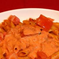 Penne Ala Vodka (Gf) · Penne with fresh tomatoes in a creamy pink vodka sauce. Gluten free penne or spaghetti avail...